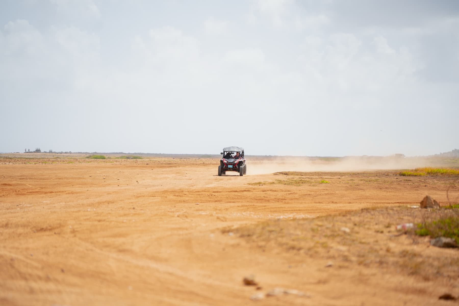 UTV racing across an Aruba desert trail