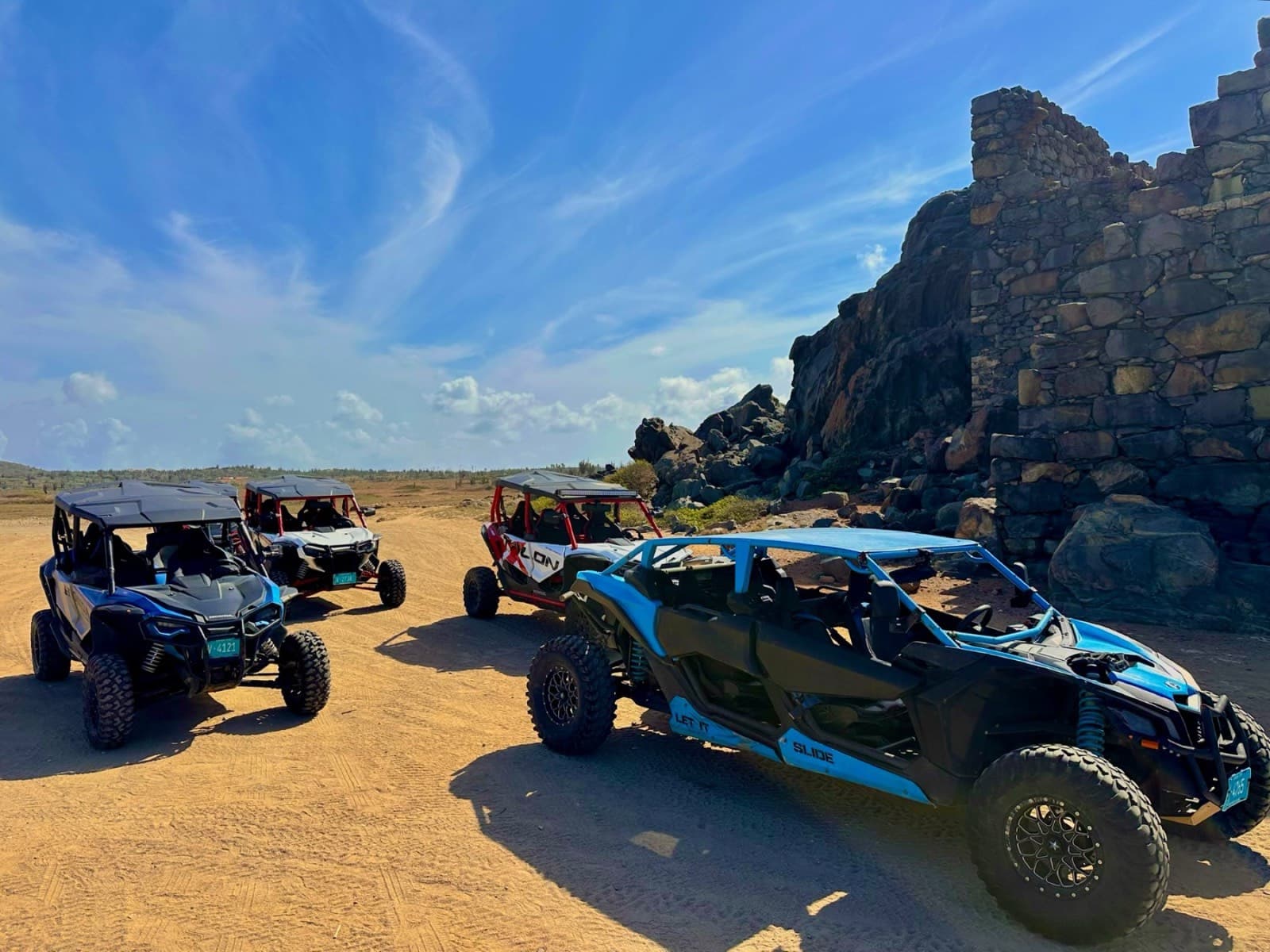 UTVs lined up at the Bushiribana gold mill ruins